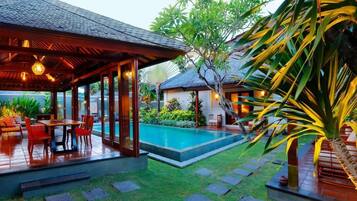 Indoor pool, outdoor pool, pool umbrellas, sun loungers