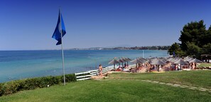 On the beach, sun-loungers, beach umbrellas, beach towels - Istion Club Hotel & Spa (Nea Propontida)