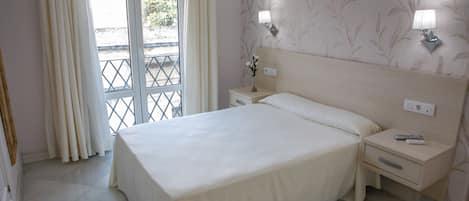 Desk, blackout curtains, free WiFi, bed sheets