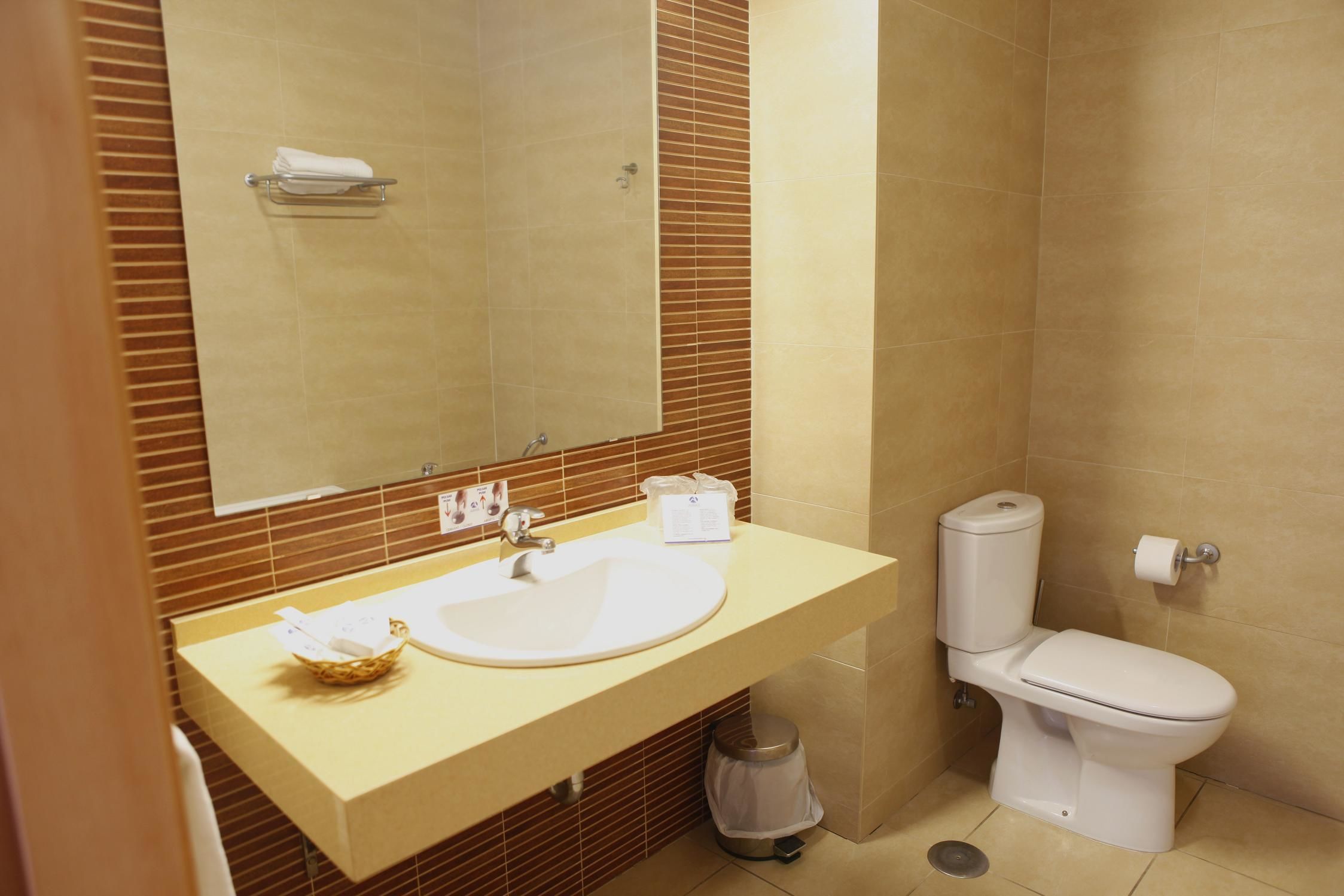 free toiletries, hair dryer, bidet, towels