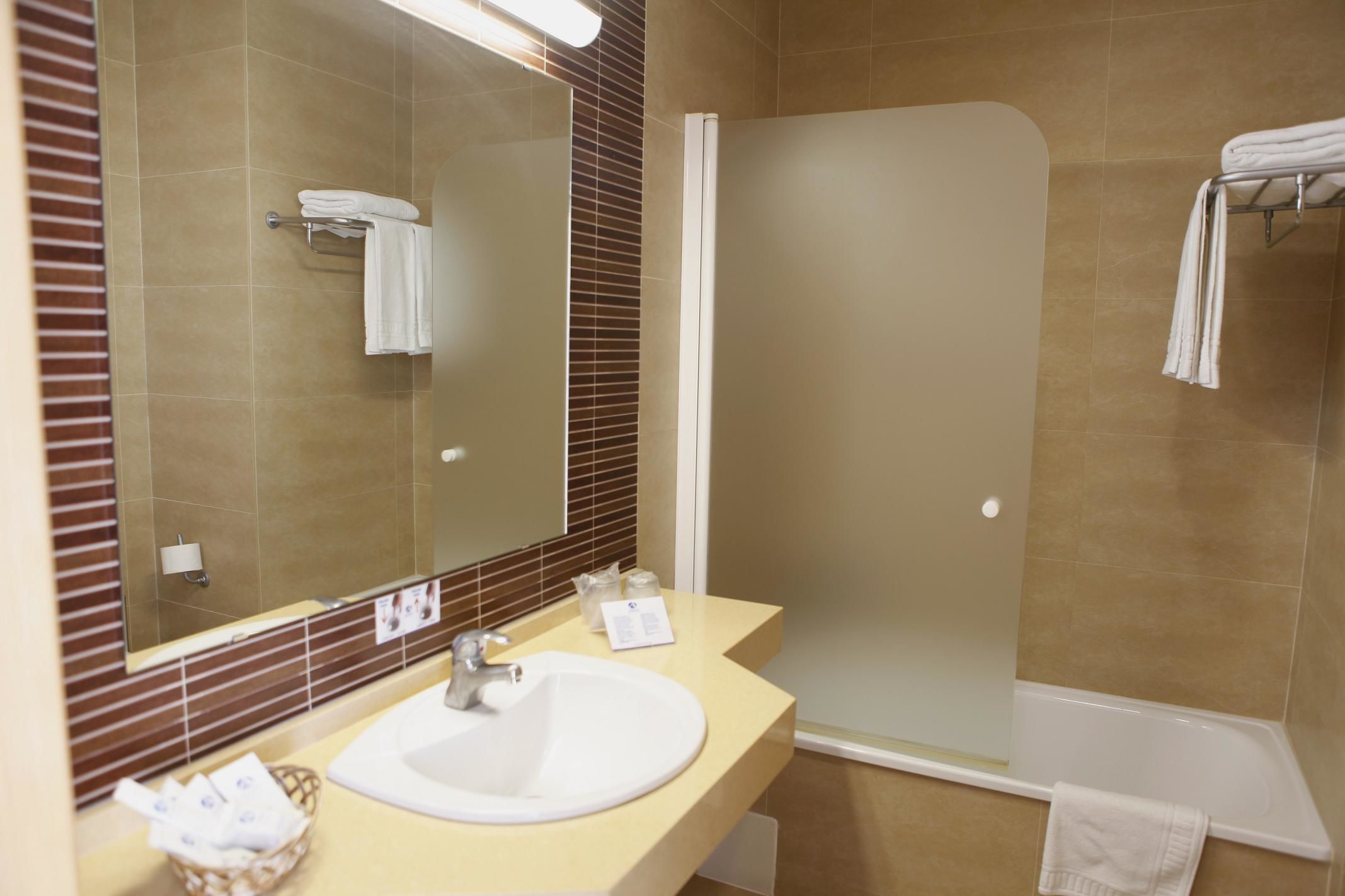 free toiletries, hair dryer, bidet, towels