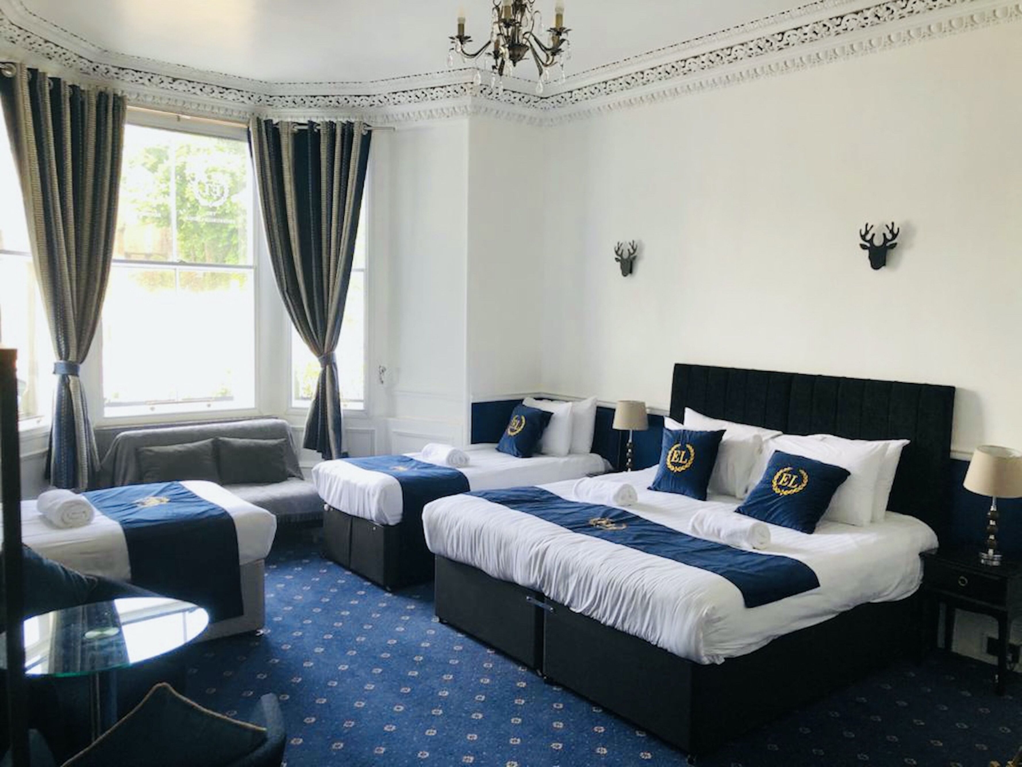 Deluxe Quadruple Room | Desk, soundproofing, iron/ironing board, free WiFi