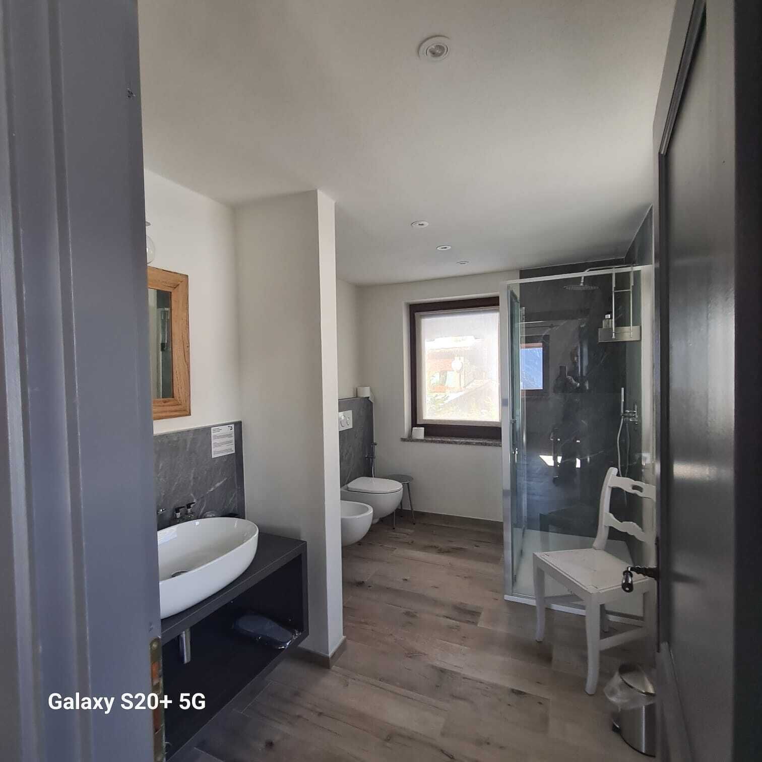 family suite | bathroom | shower, hair dryer, slippers, bidet