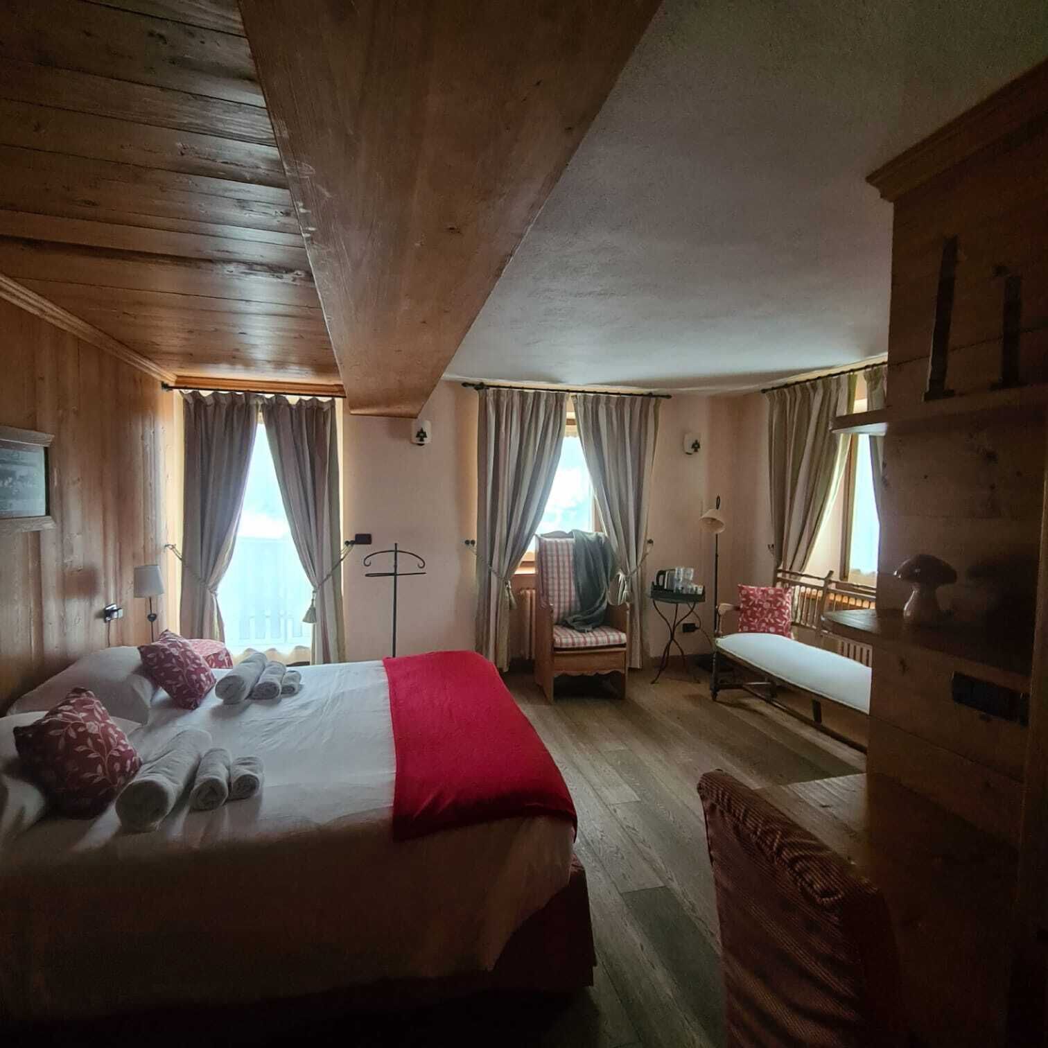 junior double room, 1 double bed, mountain view, garden area | bathroom | shower, hair dryer, slippers, bidet