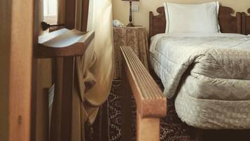 Premium bedding, down duvets, in-room safe, desk