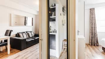Apartment, 1 Bedroom | 2 bedrooms, in-room safe, soundproofing, iron/ironing board