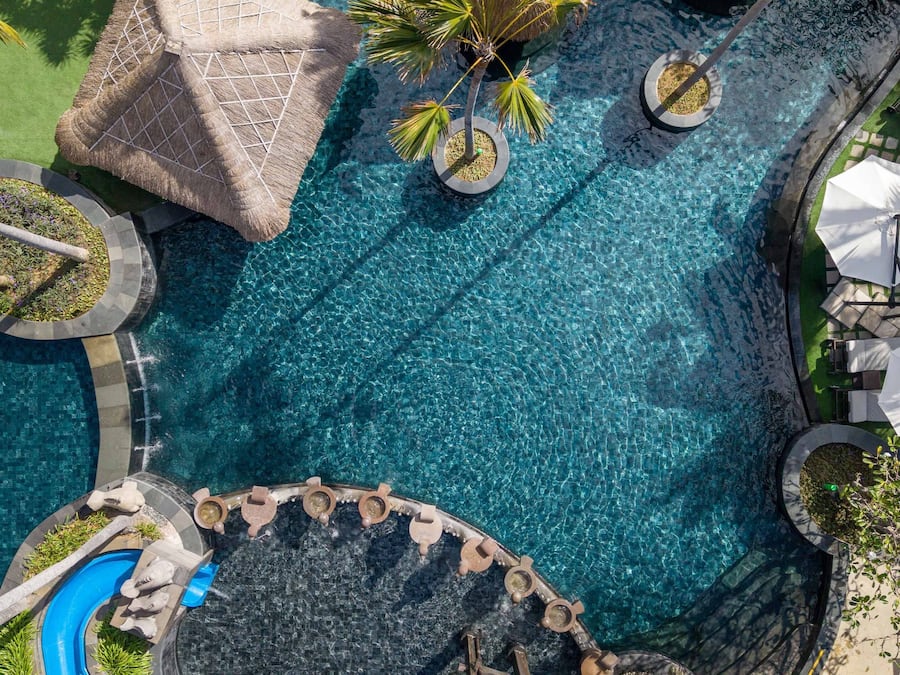4 outdoor pools, open 8:00 AM to 8:00 PM, pool umbrellas, sun loungers