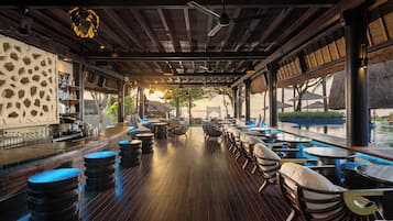 Breakfast, lunch, dinner served; international cuisine, pool views