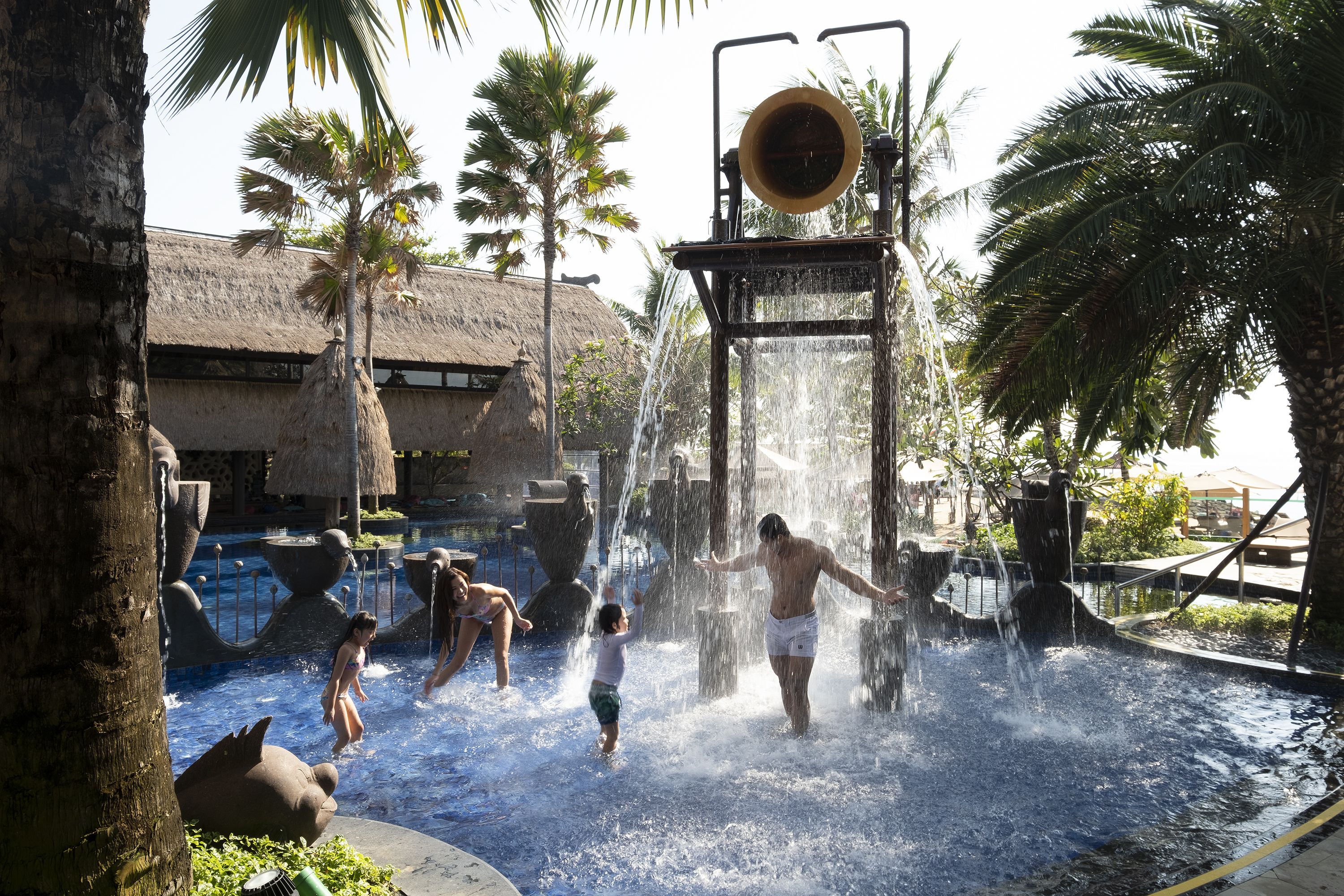 4 outdoor pools, open 8:00 AM to 8:00 PM, pool umbrellas, pool loungers