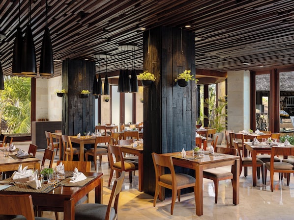 Breakfast, lunch, dinner served; international cuisine, pool views