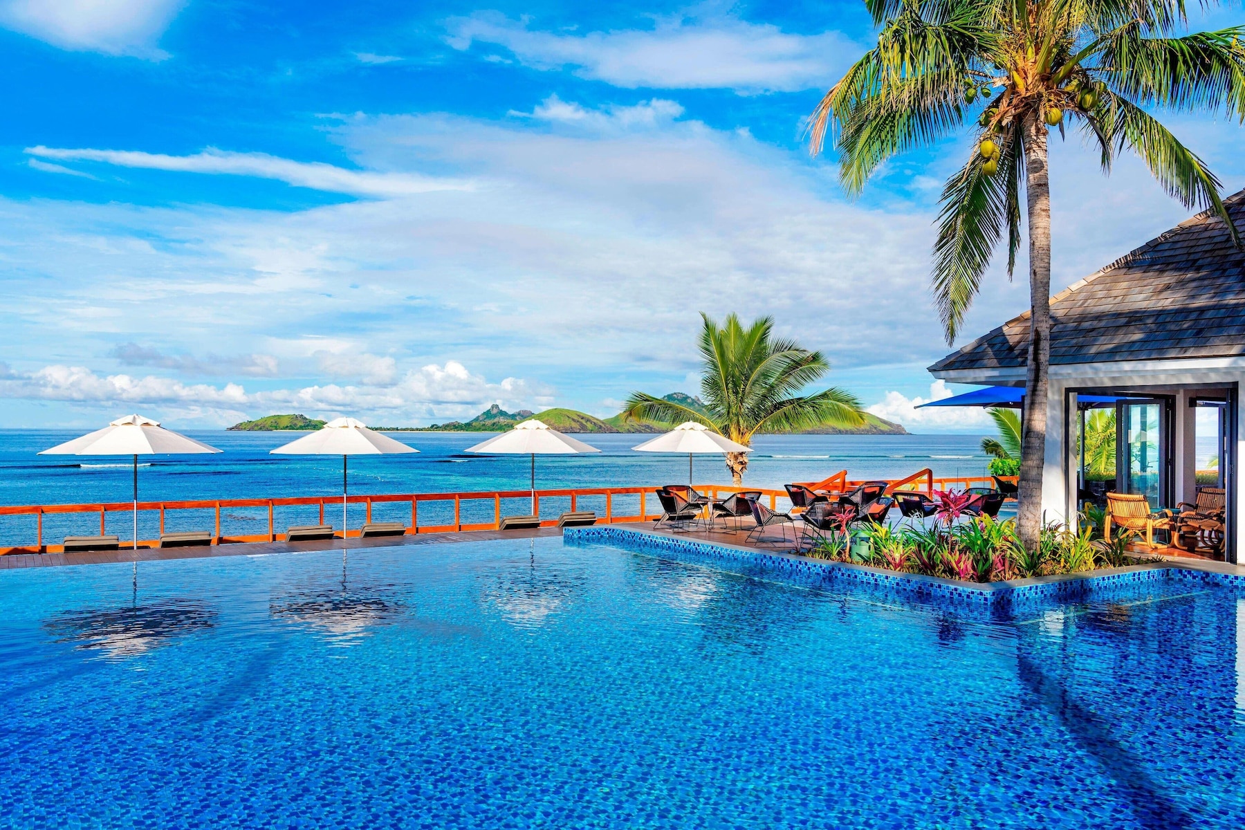 Outdoor pool, pool umbrellas, pool loungers