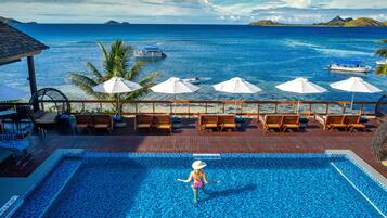 Outdoor pool, pool umbrellas, pool loungers