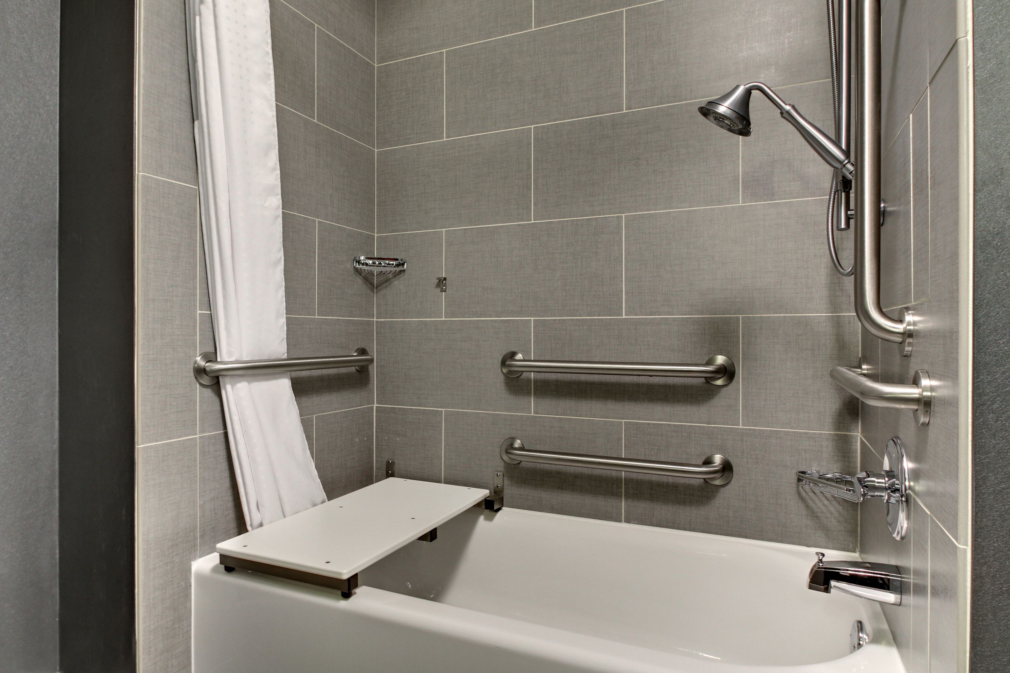 deluxe suite, 1 king bed, accessible, non smoking | in-room safe, desk, iron/ironing board, rollaway beds