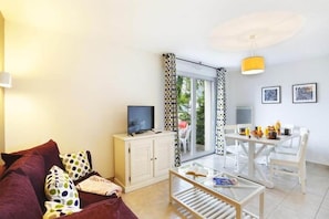 Comfort-talo, 2 makuuhuonetta, näköala puutarhaan (duplex) | Oleskelualue | 32–tuumainen televisio, jossa digitaalikanavat