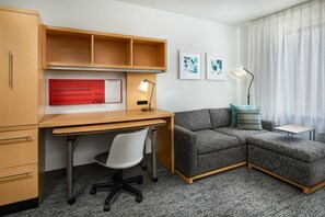 Laptop workspace, iron/ironing board, free cribs/infant beds