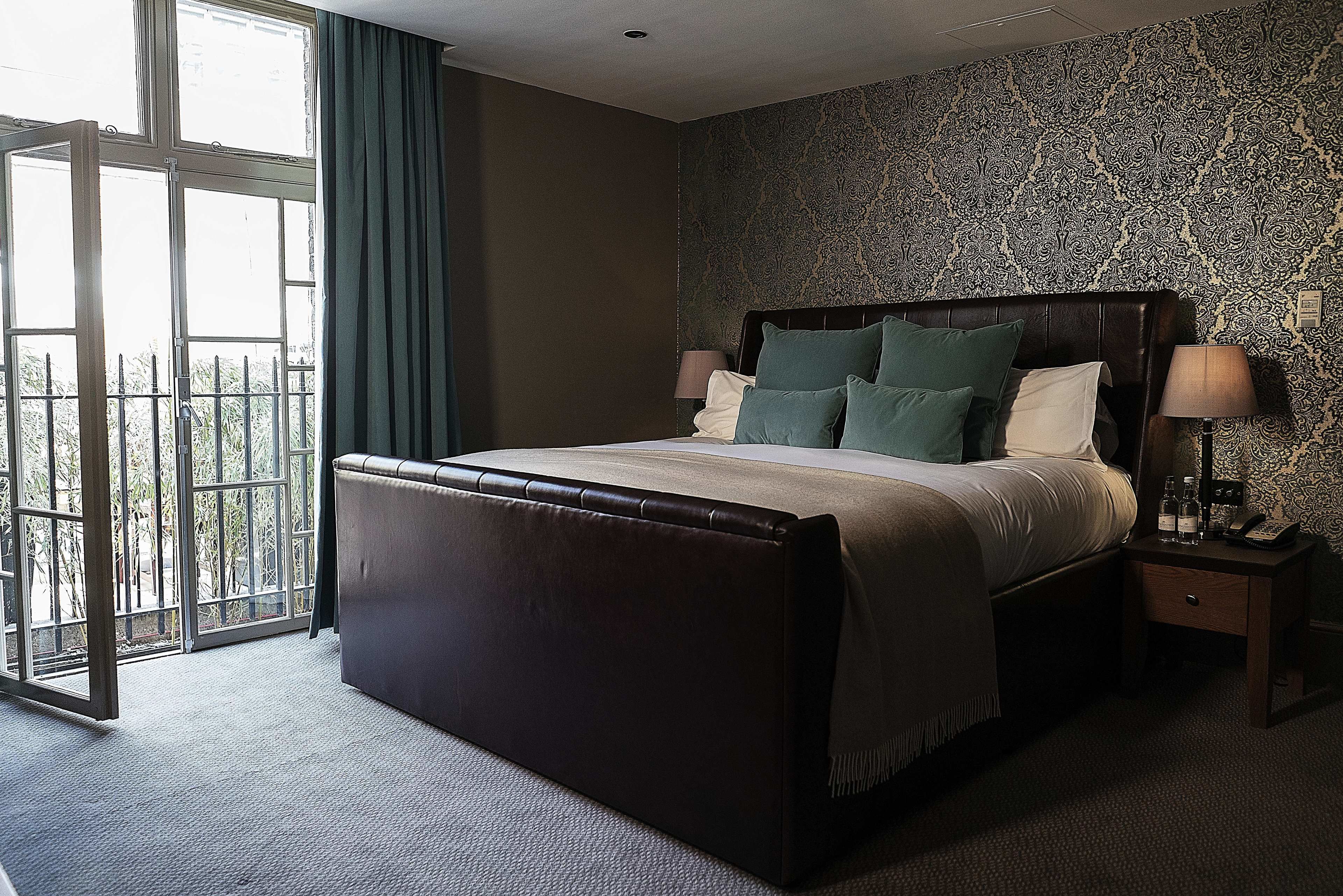 junior suite | desk, blackout curtains, iron/ironing board, free wifi