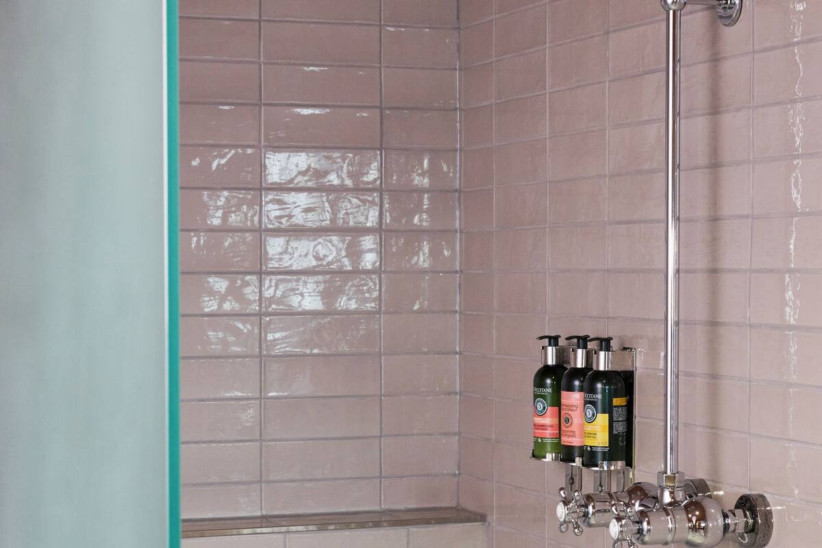 junior suite | bathroom | separate bathtub and shower, free toiletries, hair dryer, towels