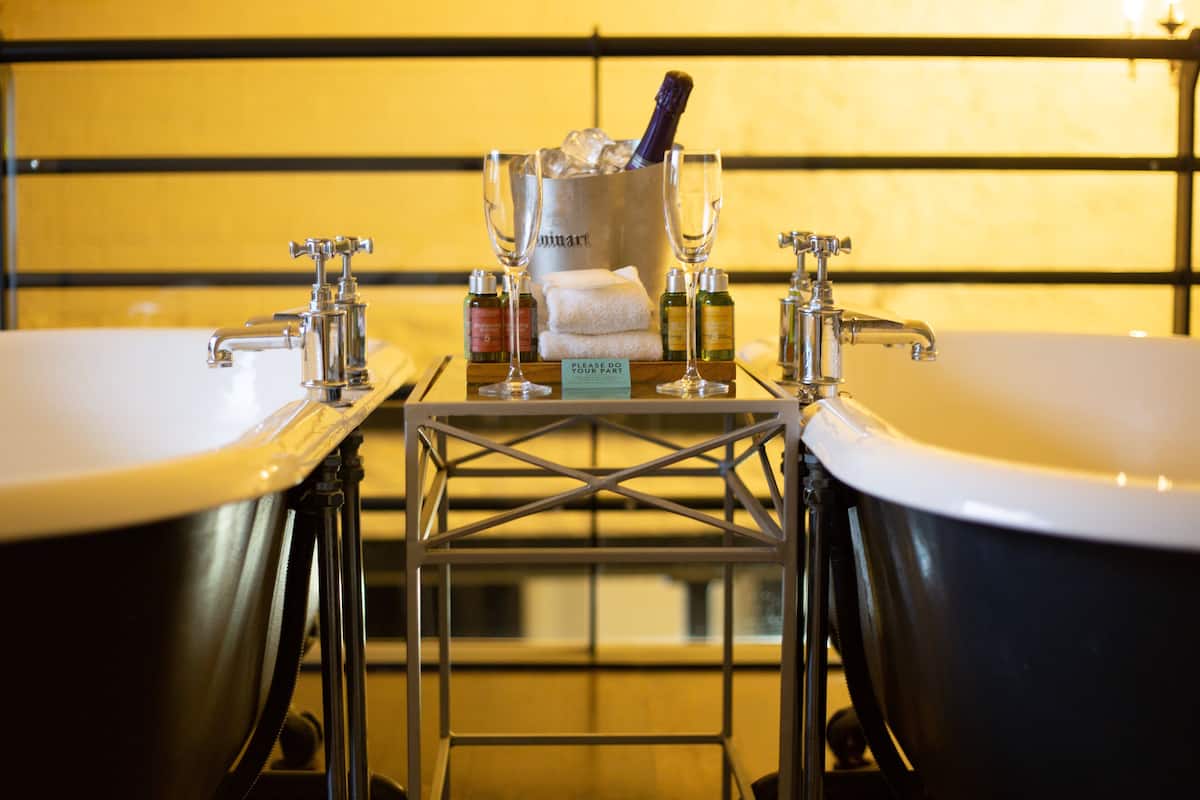 signature suite | egyptian cotton sheets, premium bedding, desk, iron/ironing board