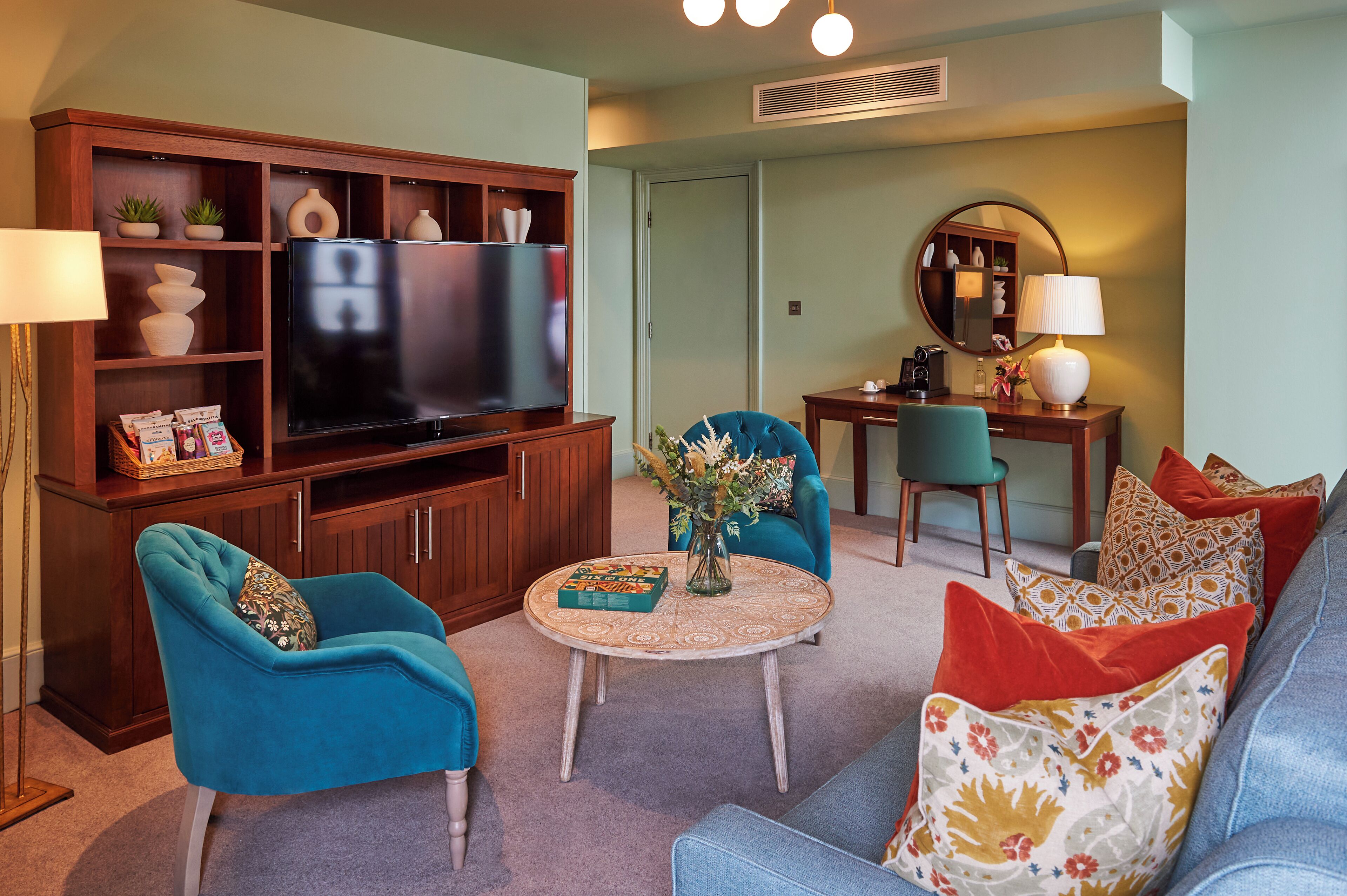 signature suite | desk, blackout curtains, soundproofing, iron/ironing board