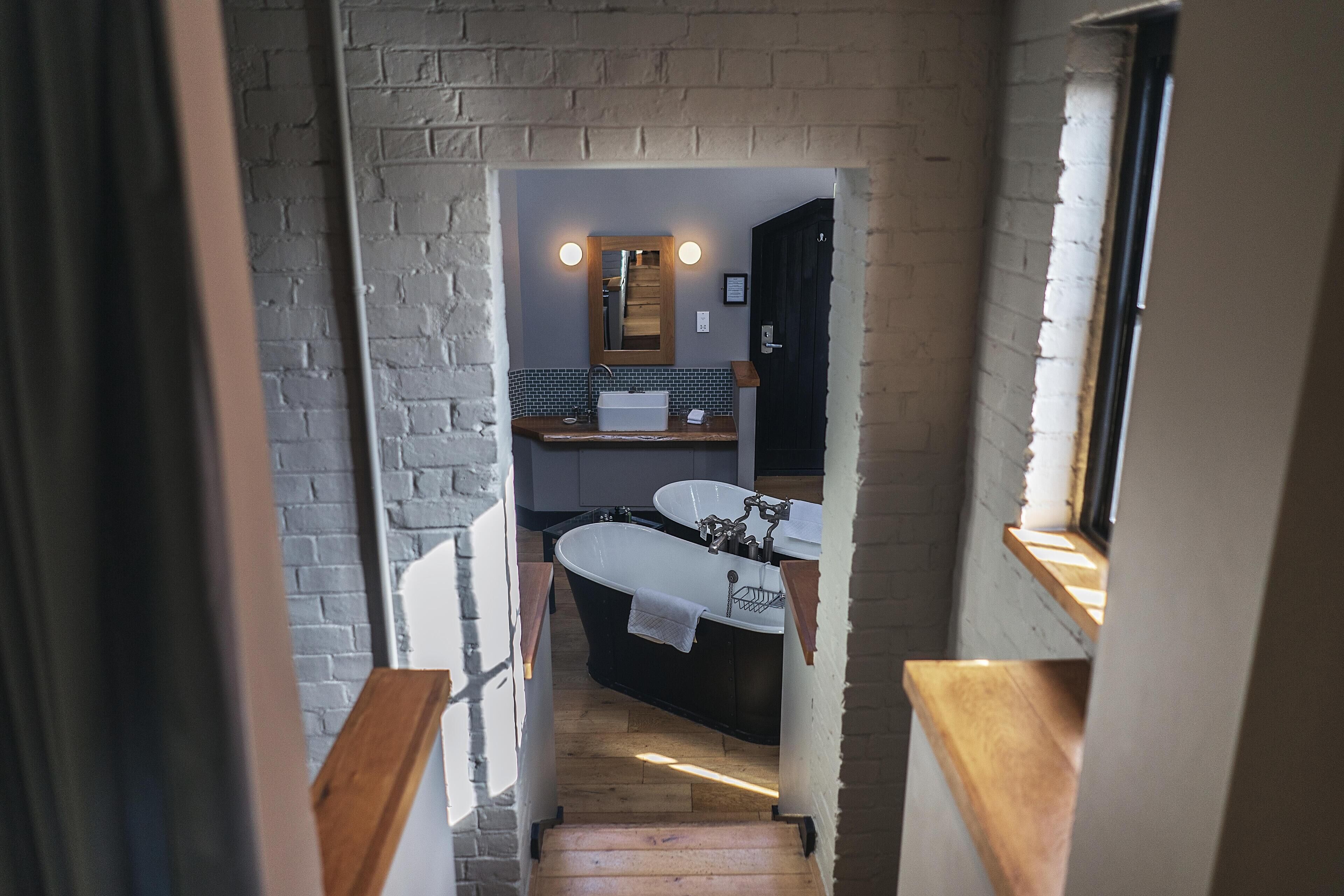 signature duplex suite | bathroom | free toiletries, hair dryer, towels, soap