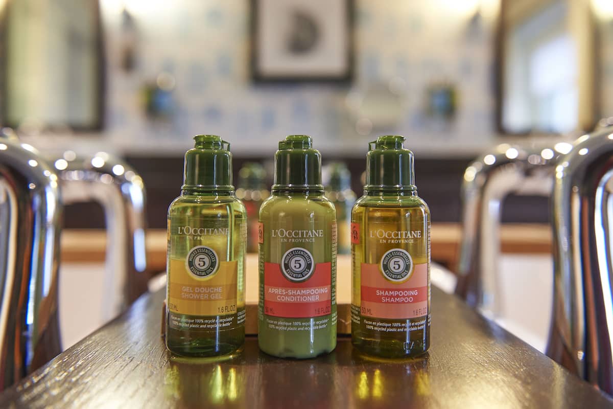 signature suite | bathroom | shower, free toiletries, hair dryer, towels