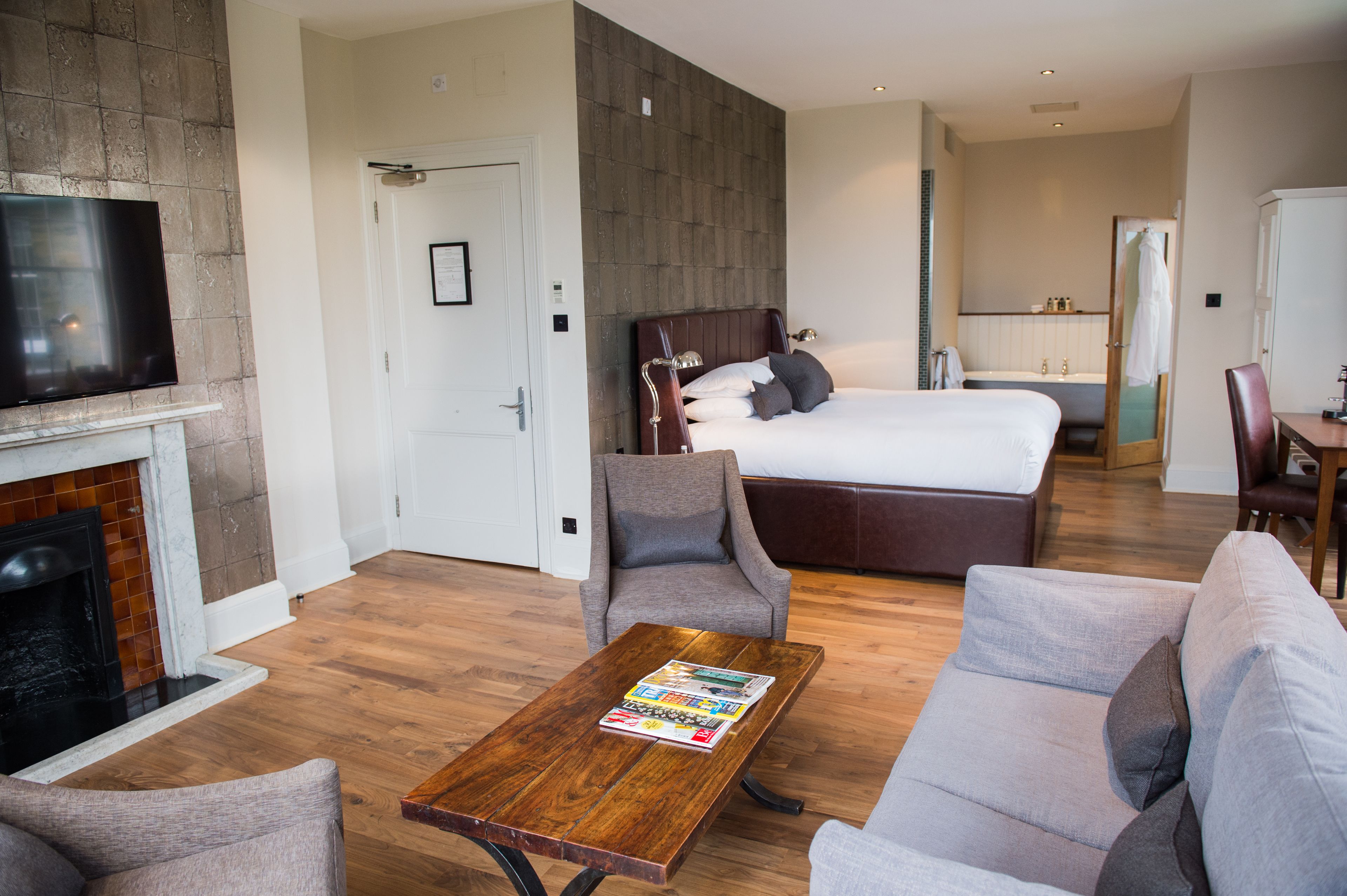 suite | egyptian cotton sheets, premium bedding, desk, blackout curtains