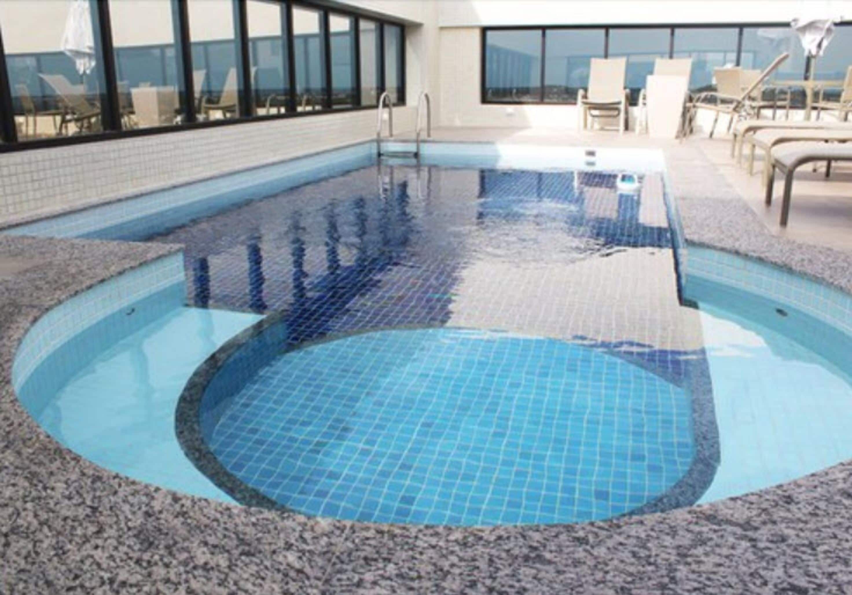 outdoor pool, pool umbrellas, pool loungers