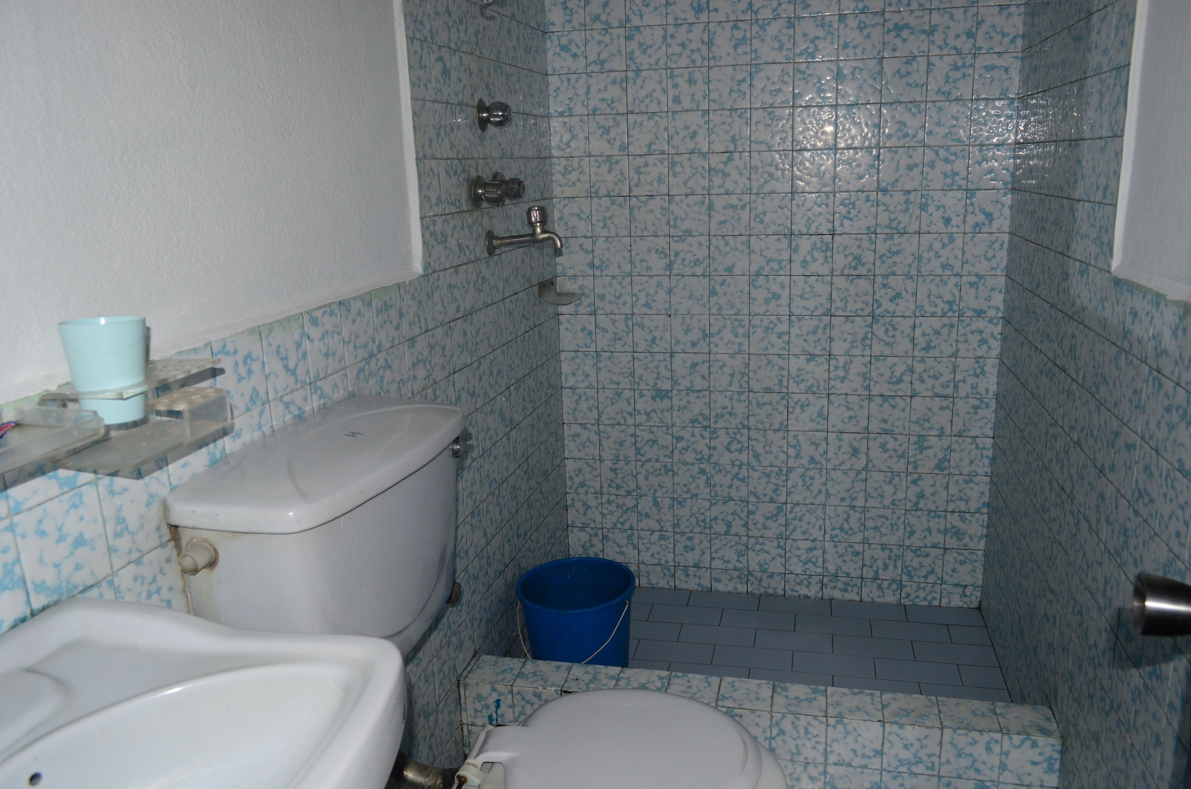 standard double room | bathroom | shower, hair dryer, towels