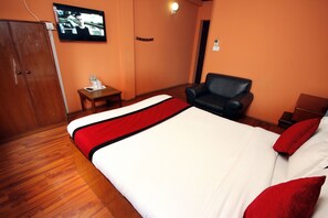 Individually decorated, individually furnished, desk, rollaway beds