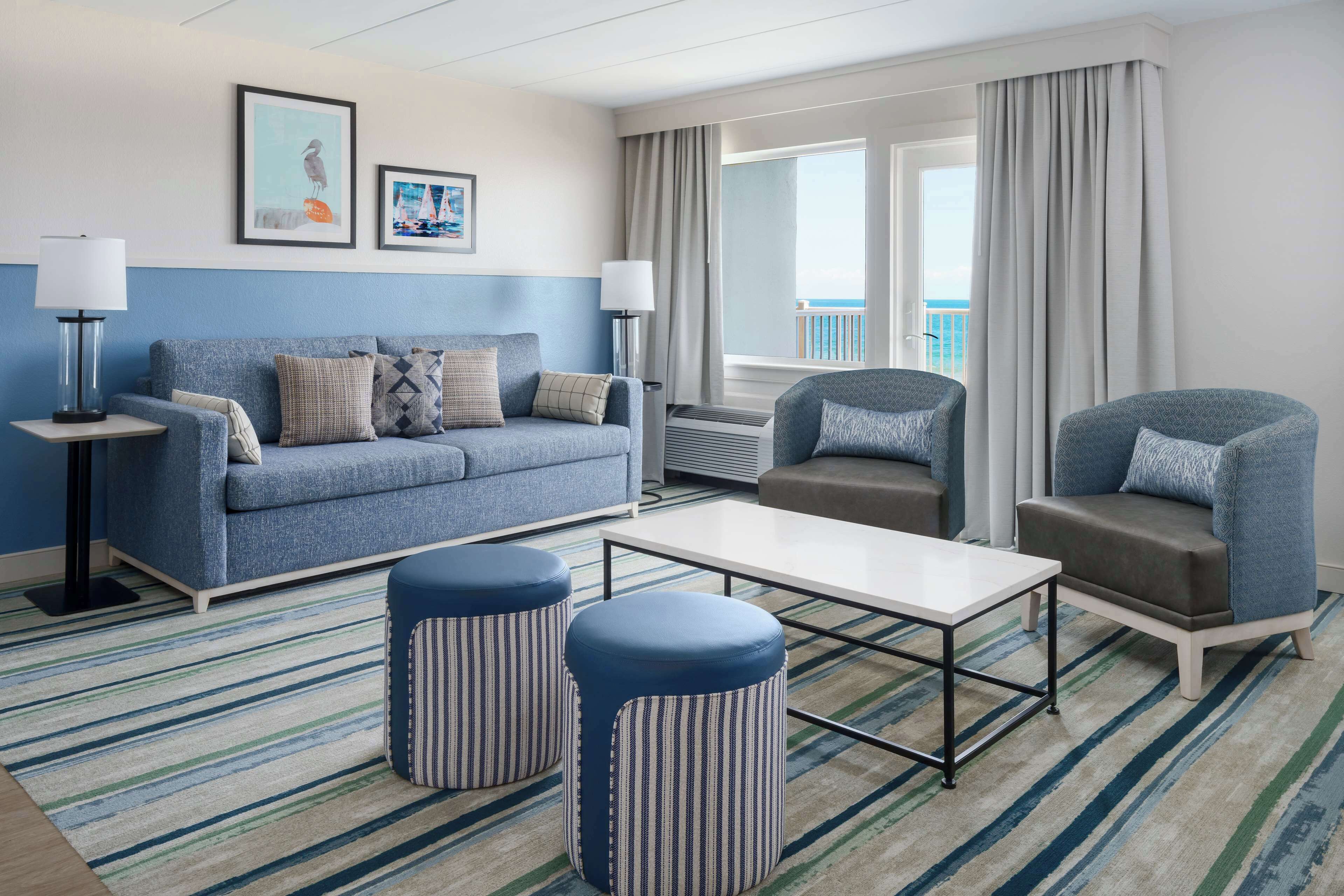 studio suite, 1 king bed, oceanfront | living area | 46-inch flat-screen tv with cable channels, tv