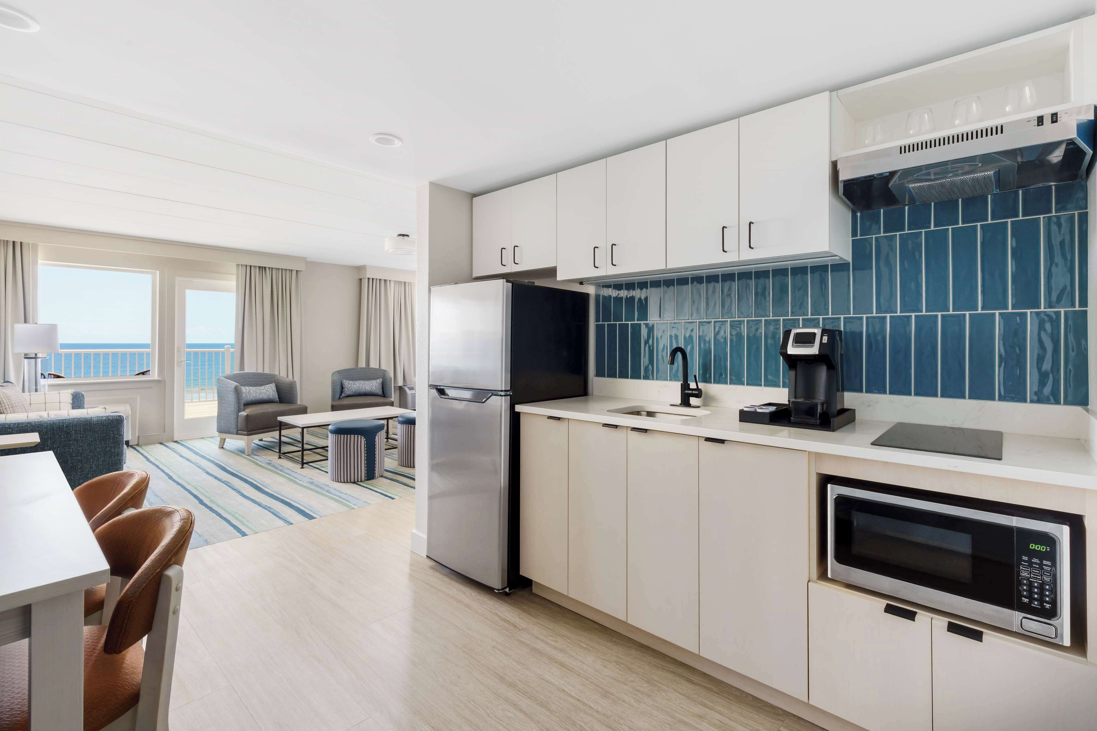 studio suite, 1 king bed, oceanfront | living area | 46-inch flat-screen tv with cable channels, tv