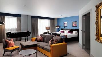 Suite | In-room safe, individually decorated, desk, blackout drapes