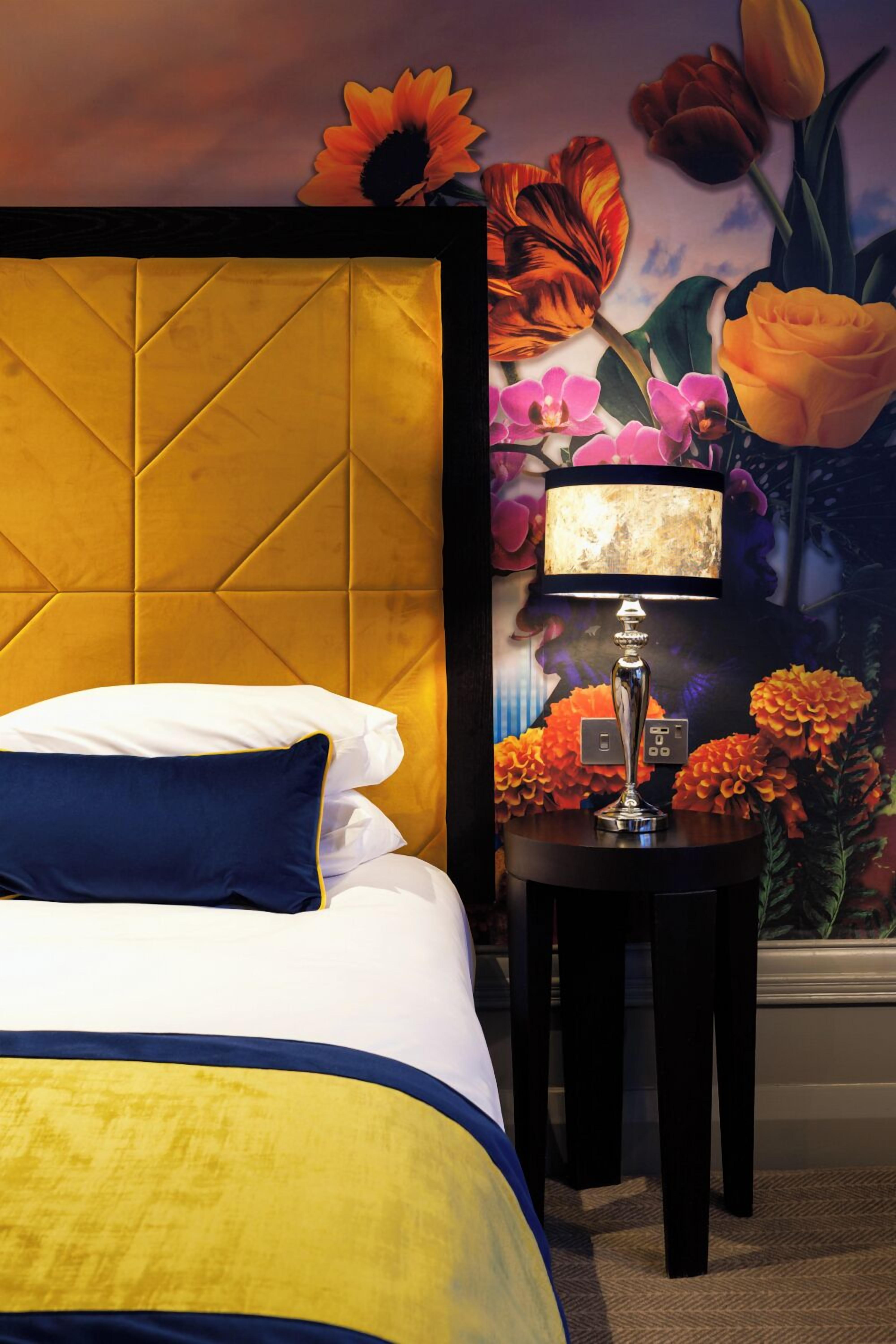 club deluxe double room | in-room safe, individually decorated, desk, blackout curtains