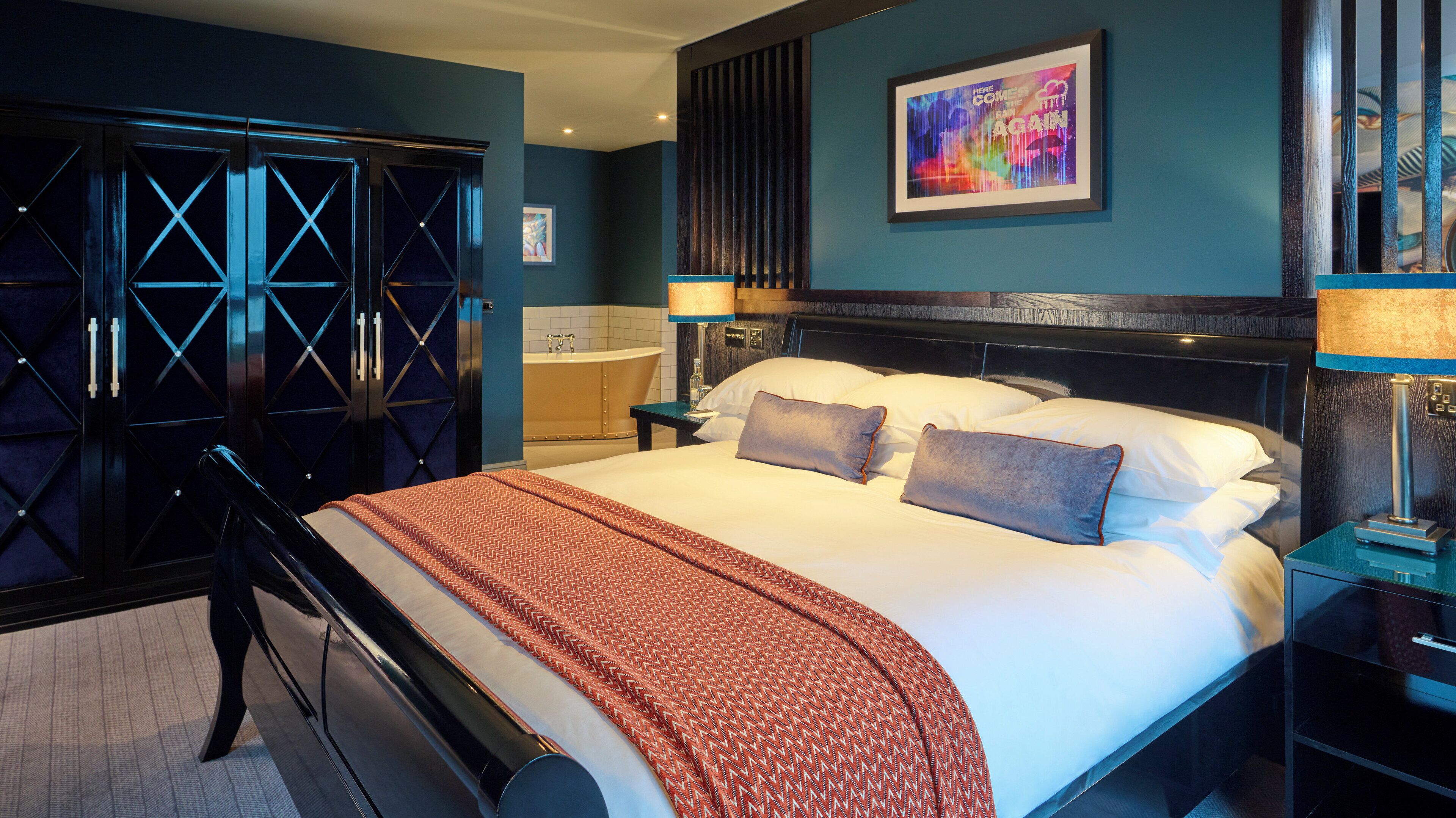 signature suite | in-room safe, individually decorated, desk, blackout curtains