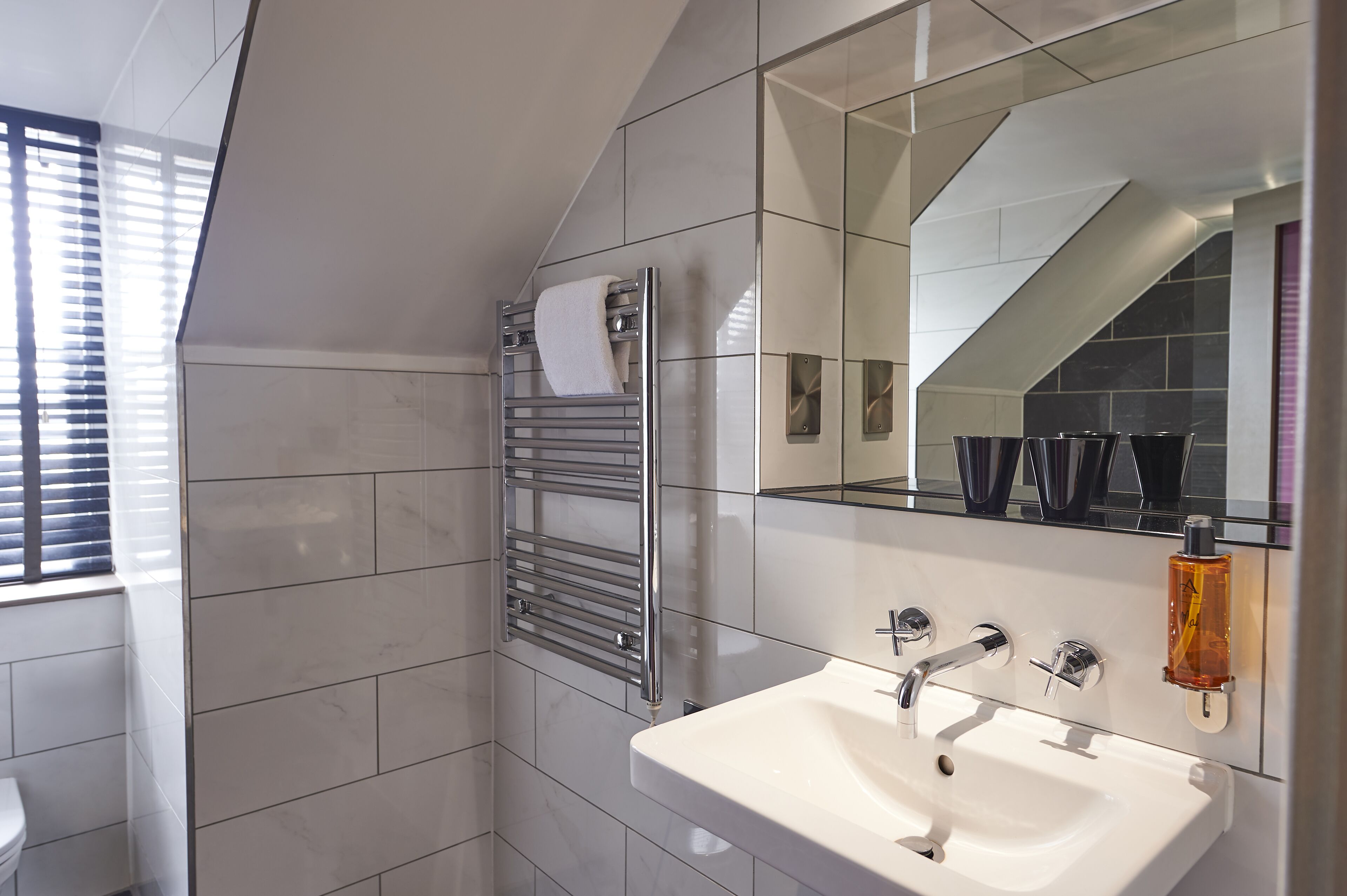 signature suite | bathroom | free toiletries, hair dryer, towels, soap