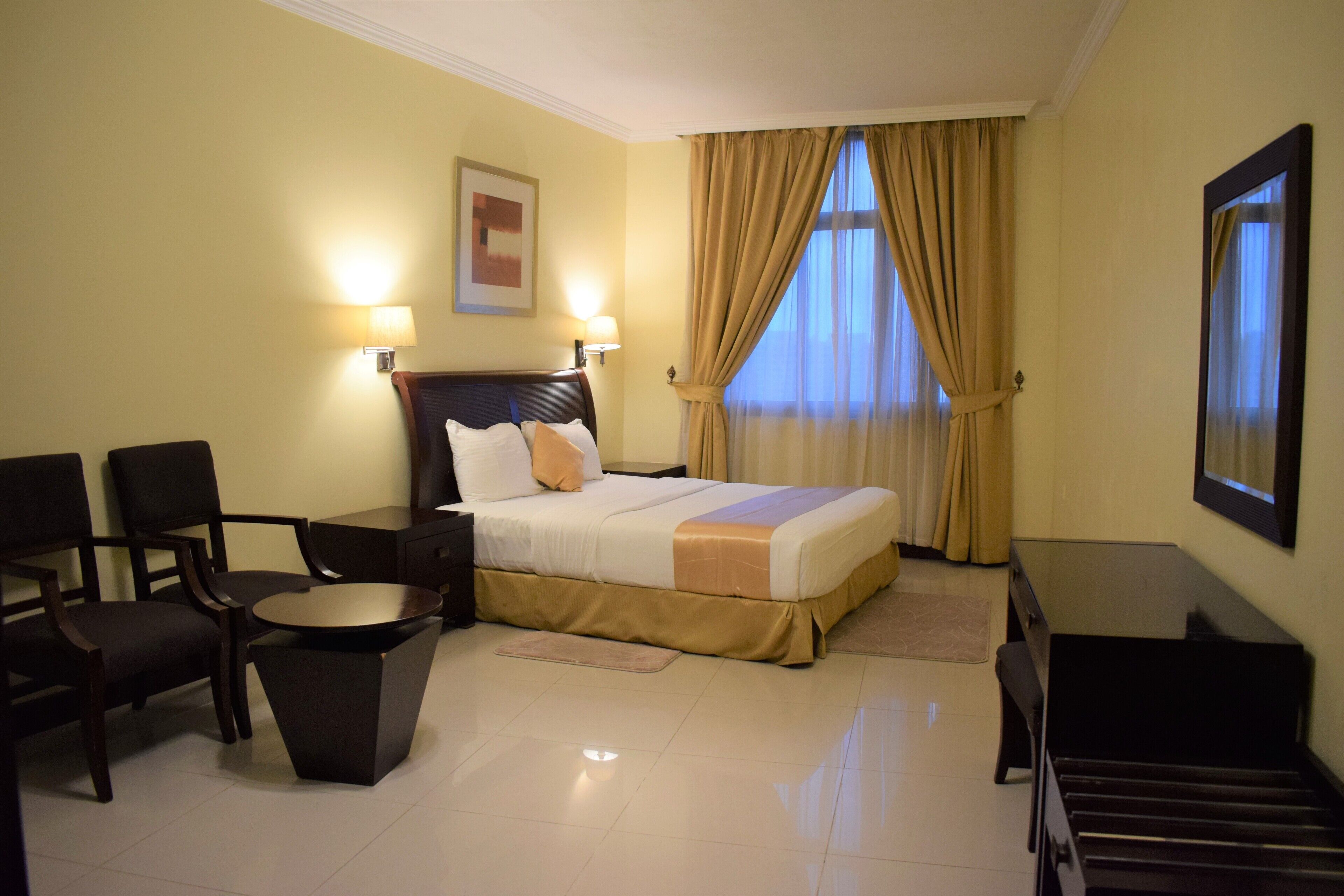 Suite, 1 Bedroom | In-room safe, soundproofing, iron/ironing board, free WiFi