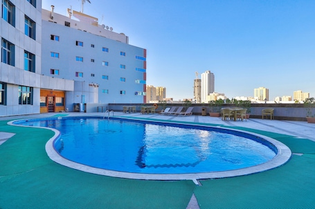 Outdoor pool. Crown Palace Hotel Ajman