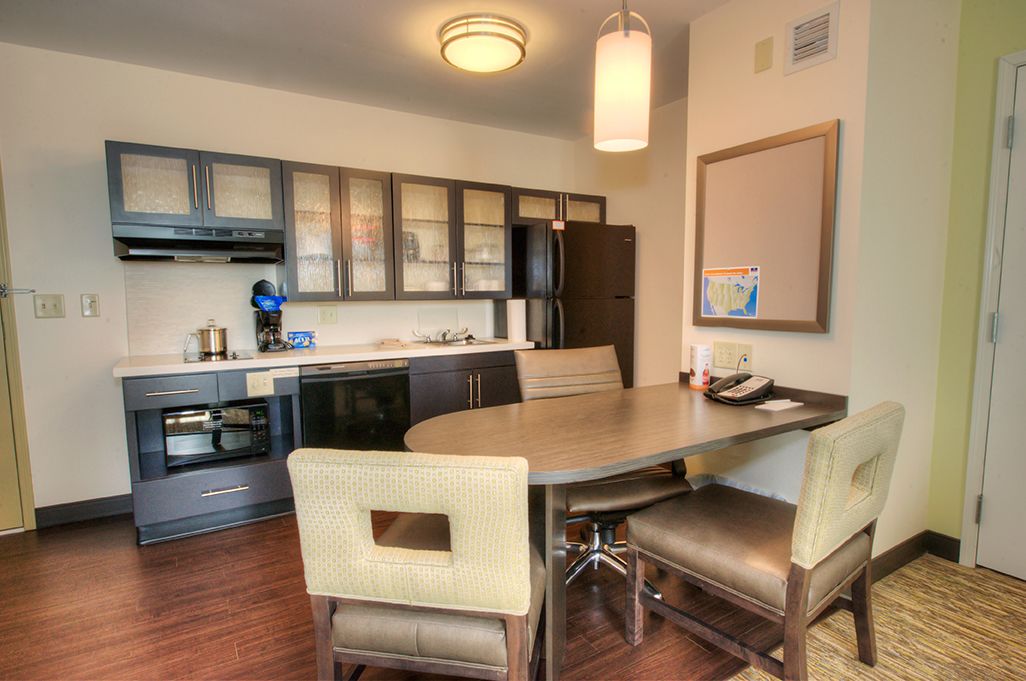 suite, 1 bedroom | private kitchen | full-sized fridge, dishwasher, cookware/dishes/utensils
