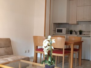Full-sized fridge, microwave, coffee/tea maker, cookware/dishes/utensils