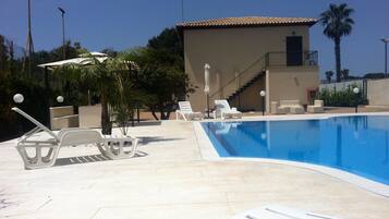 Seasonal outdoor pool, sun loungers