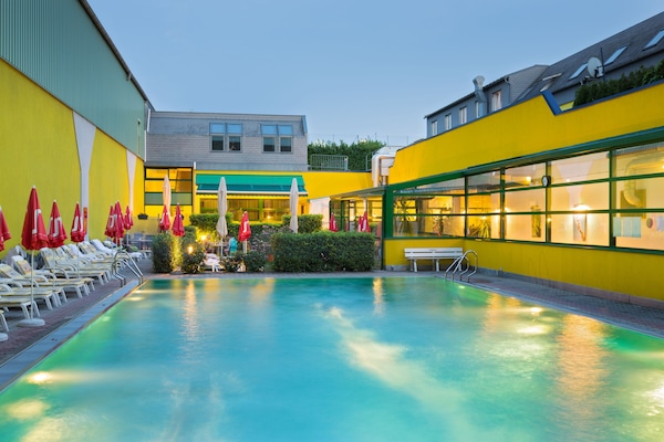 Seasonal outdoor pool, open 8 AM to 10 PM, pool umbrellas, sun loungers