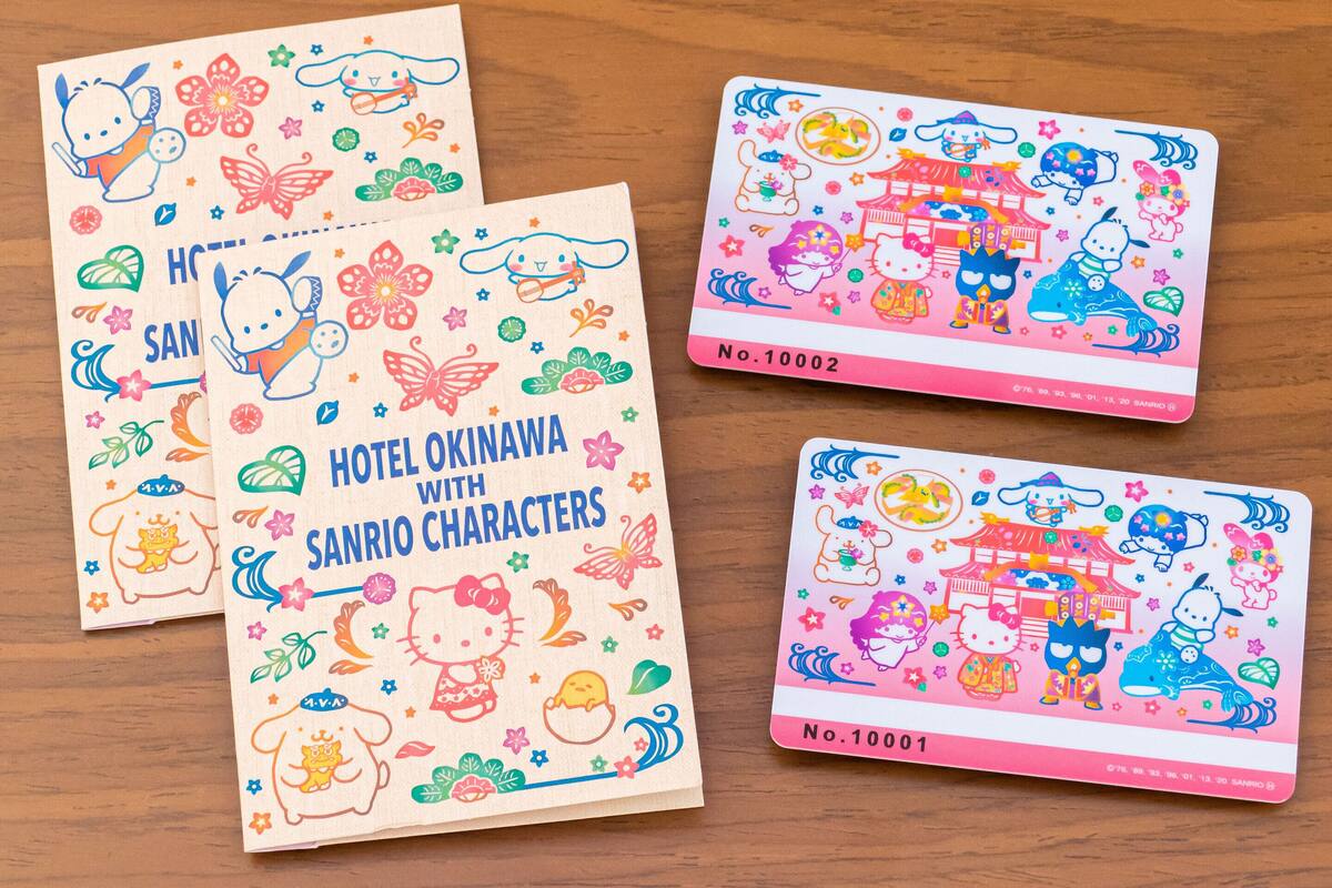Three cards with illustrations of Sanrio characters and Japanese architecture, labeled with numbers 10001 and 10002.