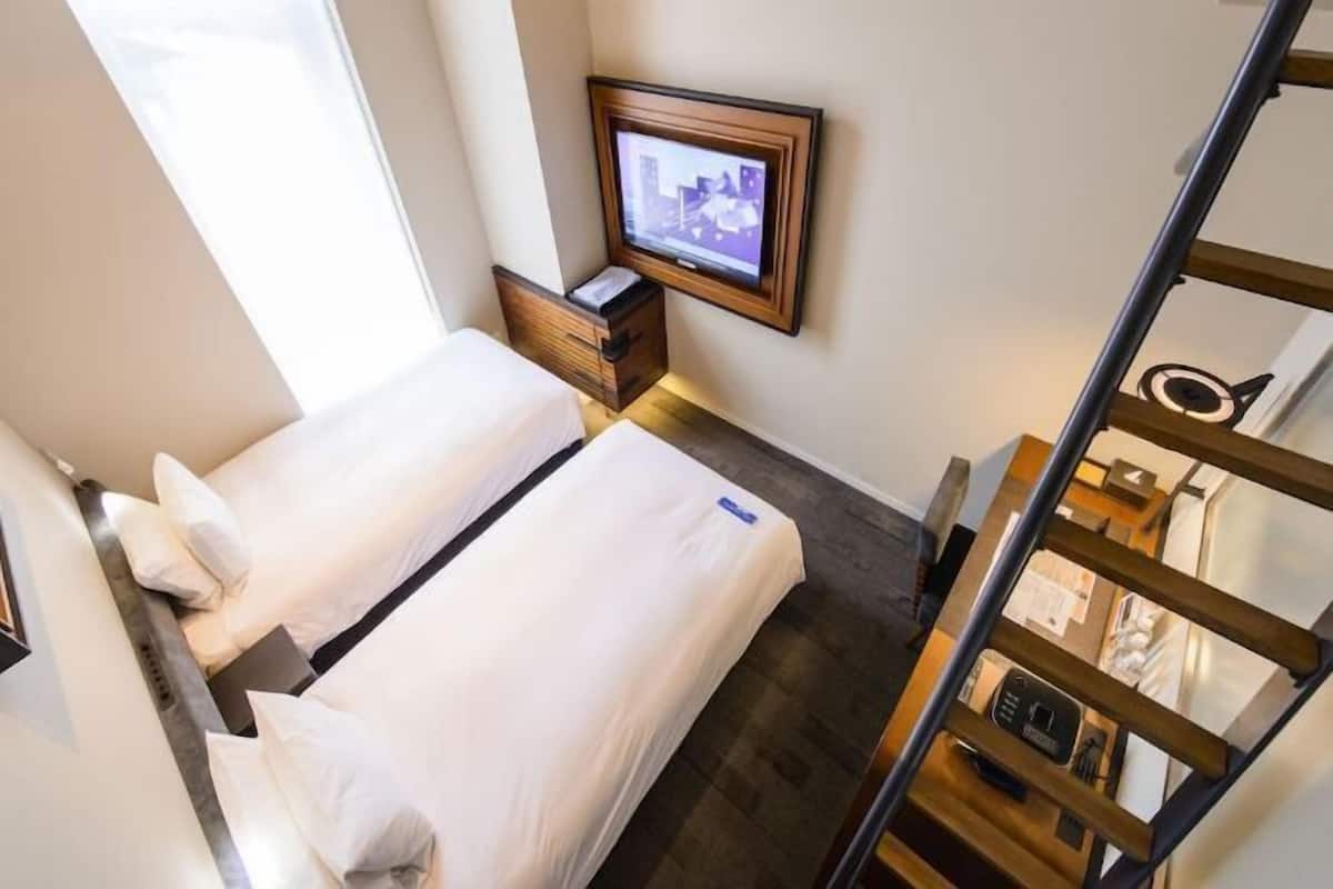 Premium bedding, down comforters, in-room safe, individually furnished