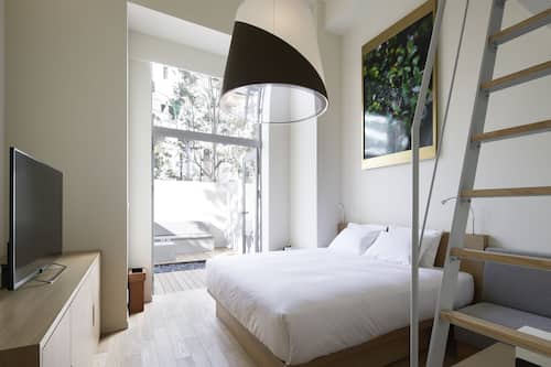 Habitació doble Deluxe, no fumadors, planta baixa (with Loft and Terrace) | Roba de llit d'alta qualitat, cobrellits i caixa forta a l'habitació