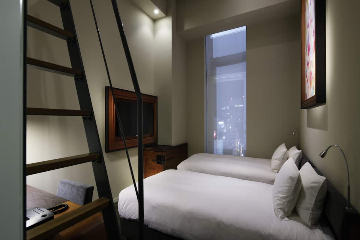 Standard Twin with Loft, Non Smoking, 12th Floor | Premium bedding, down comforters, in-room safe, individually furnished