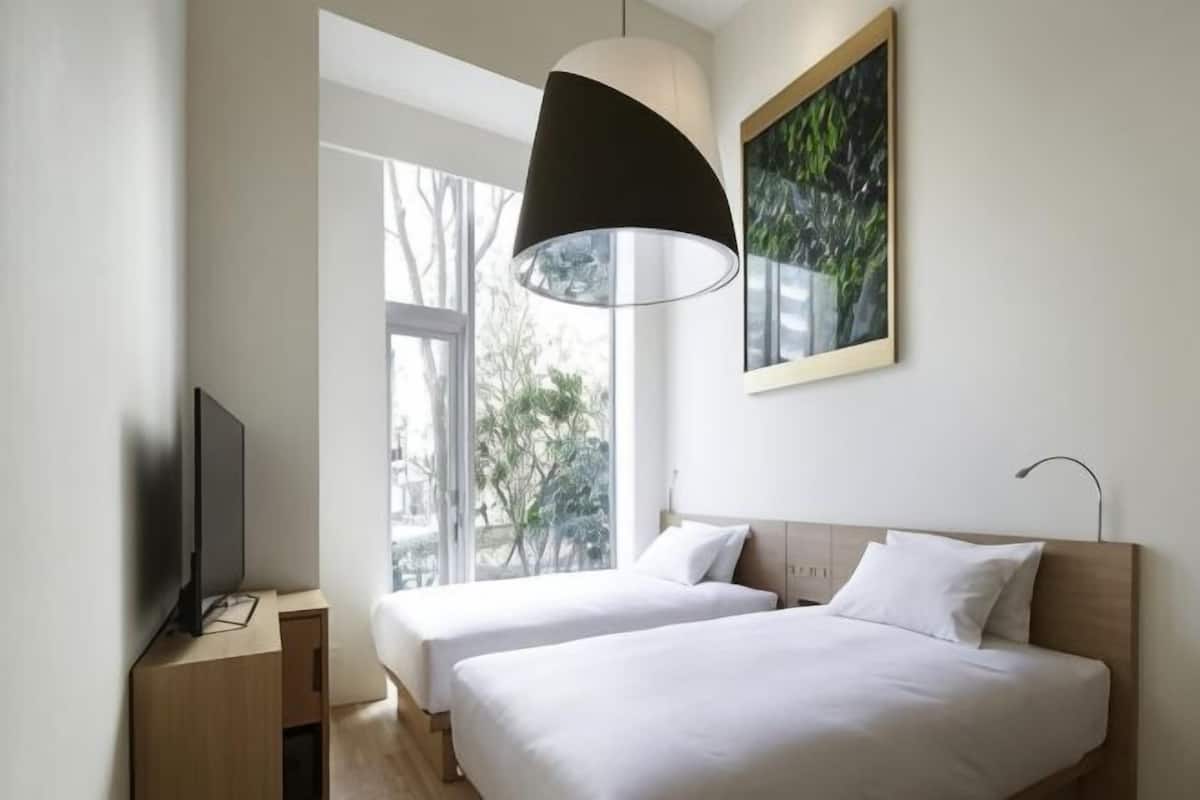 Premium bedding, down comforters, in-room safe, individually furnished