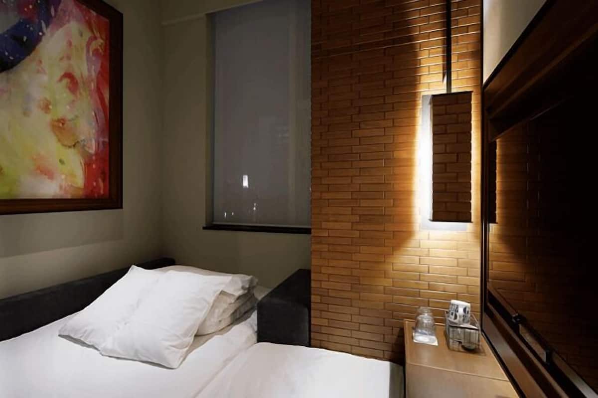 Premium bedding, down comforters, in-room safe, individually furnished