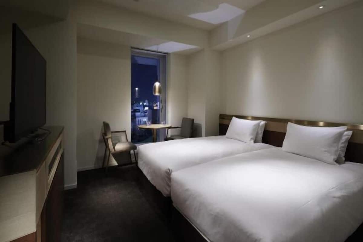 Premium bedding, down comforters, in-room safe, individually furnished