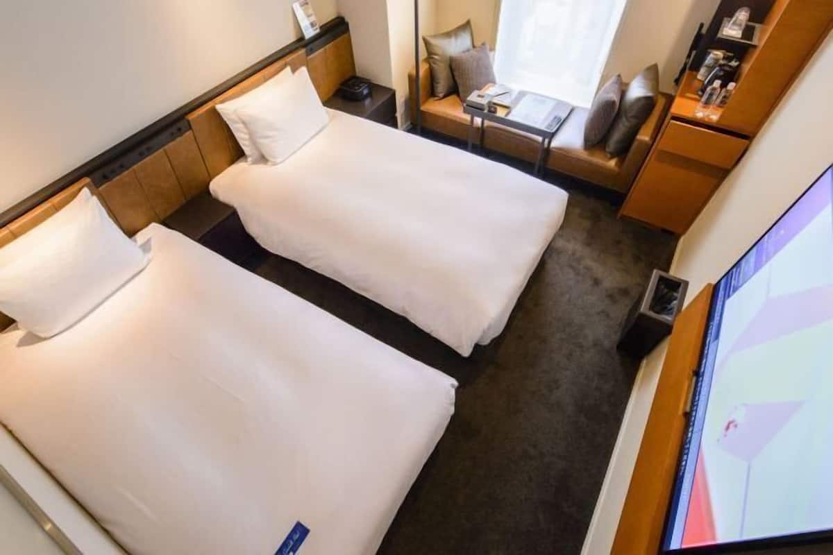 Premium bedding, down comforters, in-room safe, individually furnished
