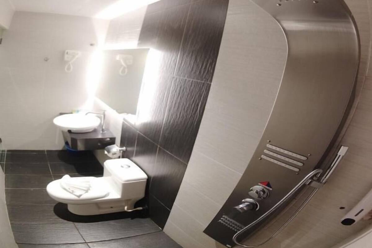 Bathroom | Shower, hair dryer, towels